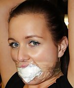 Lena tied up, mouth-stuffed, tape-gagged, nipple-clamped, whipped